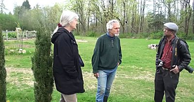 Dr. Vrain with Peggy and Tony in his farm